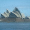 Our view of the Sydney Opera House in the rain, looking through the window of a ferry. (Photo by Morgan C. Smith)