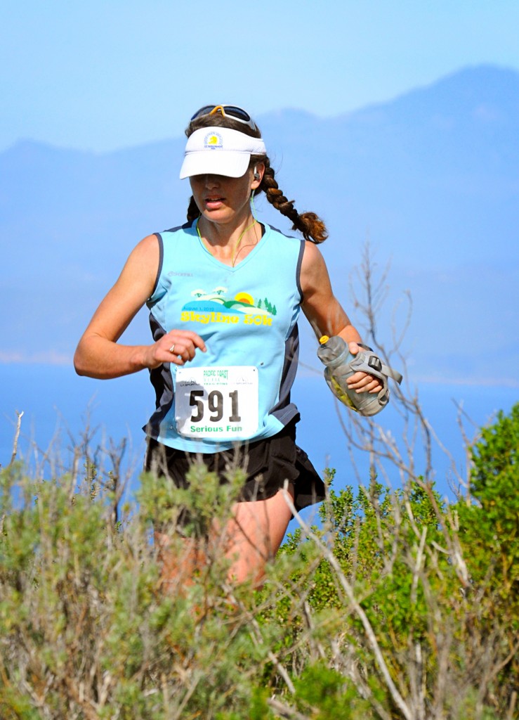 Approaching the halfway point in the race, toward the end of the first 25K loop, I kept my head down and just tried to keep going. (Photo by Luis Escobar)