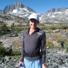 Deena takes a break in front of Banner Peak.