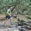 Ken Michal running the 100-mile HURT race. "I think a positive attitude and a smile are the most effective tricks an ultra runner can have in their arsenal!!" (Photo reprinted with permission by Robert P. Smith)