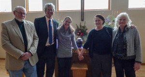 Siblings—Larry, David, me, Martha, Shannon—in front of the altar with Dad's urn.