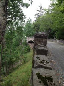 One of the stone guardrails and bridges engineered by Rockefeller.