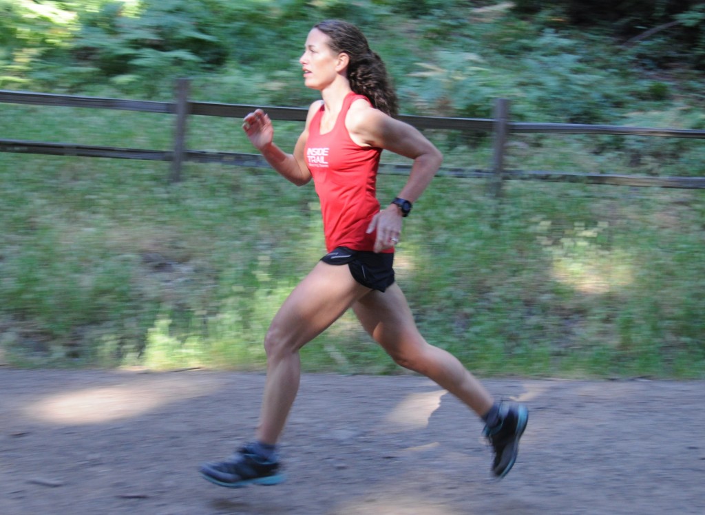 Running strong in June, in spite of a growing pain in my foot and back. (photo by Jenn Fox)