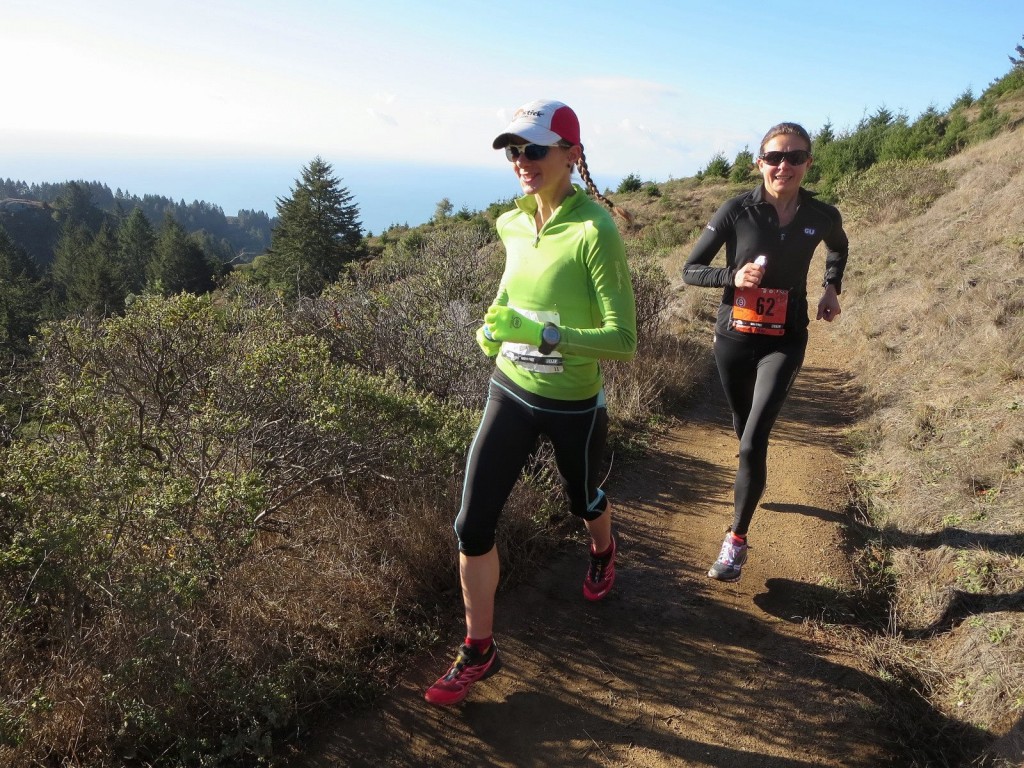 Caitlin Smith in front pacing Magdalena Boulet to a 2nd place finish at the 2013 North Face Endurance Challenge 50-mile championship. (Photo by Leor Pantilat via Facebook)