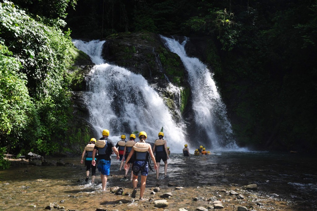 Checking out a double waterfall midway through our rafting trip.