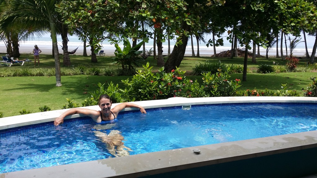 That's me in the small pool off our patio at Alma del Pacifico Hotel. Morgan is in the hammock by the beach.
