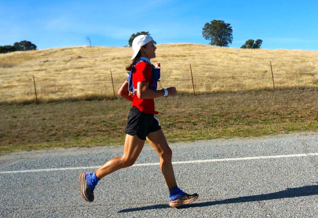 Running into the Cool Aid Station around Mile 47.