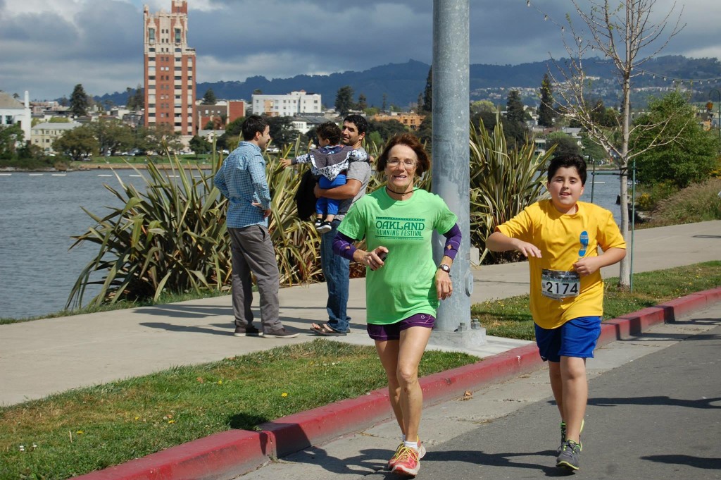 Christine helping a sixth-grade participant finish yesterday's half marathon. Photo courtesy RBO's Facebook page.