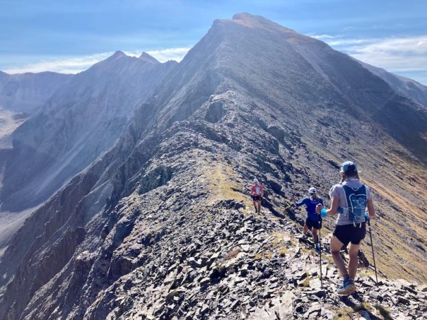 The guy behind me, Willie McBride, took this around Mile XX as we embarked on the ridge toward Telluride Peak in the distance. Anna Frost is two ahead in the red.